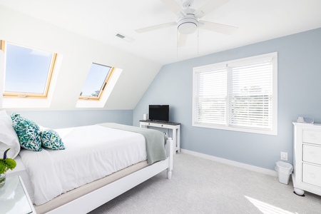 The skylights in the queen bedroom floods the room with light and are easy to close.
