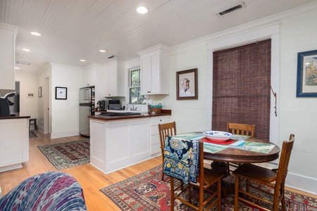 cozy dining area connected to living & kitchen