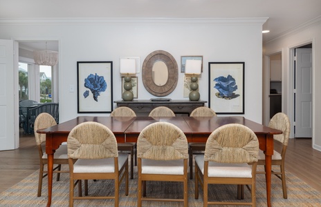 Gather around your elegant dining table for memorable meals with loved ones in this beautifully styled space.