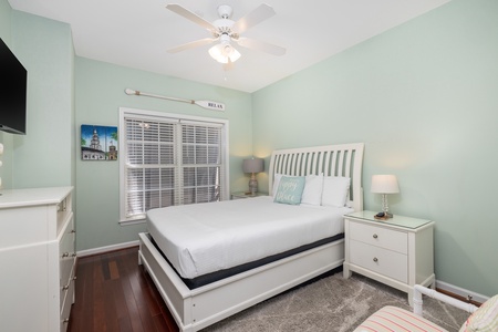 Your second bedroom is ready for relaxation with a cozy queen size bed