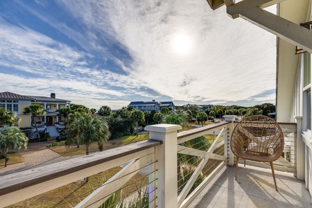 Top Floor Balcony Overlooking Palm Blvd