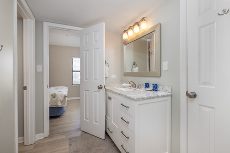 A Jack and Jill bathroom connects your queen bedroom and your bunk room