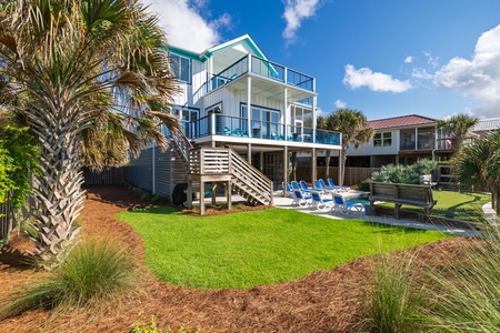 Take the back steps down to your private backyard oasis