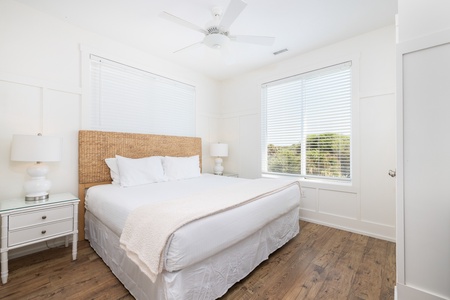 The second upstairs king bedroom faces streetside and offers its own en suite bathroom