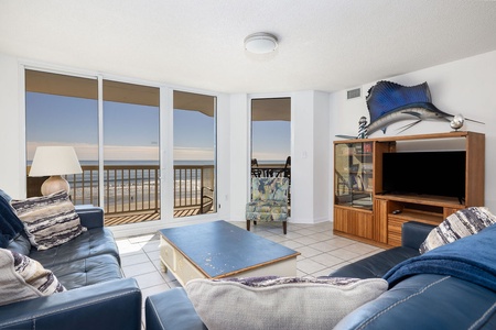 The comfortable living room seating is perfect for catching up on some TV or enjoying the company of friends and family.