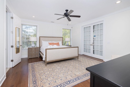 Your primary bedroom features a plush king bed.