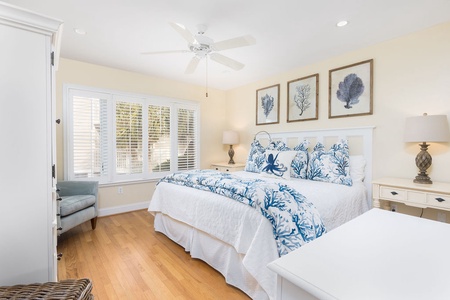 Drift into peaceful sleep in your coastal sanctuary, where soft blue linens create a relaxing retreat.