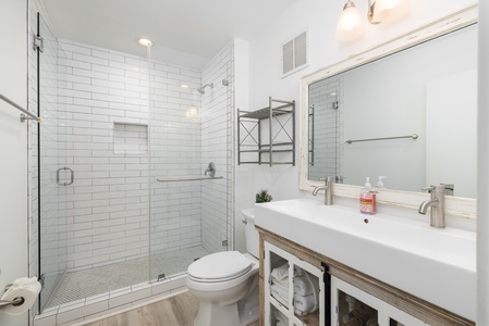 The primary en suite bathroom has been beautifully updated