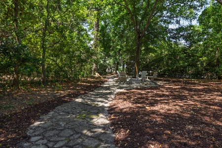Easy Breezy is set on lush property with large outdoor areas for walking