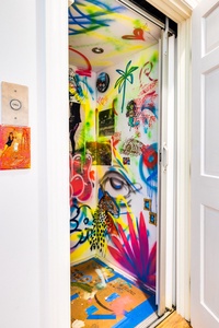 Your street art elevator conveniently takes you from your first to second floor