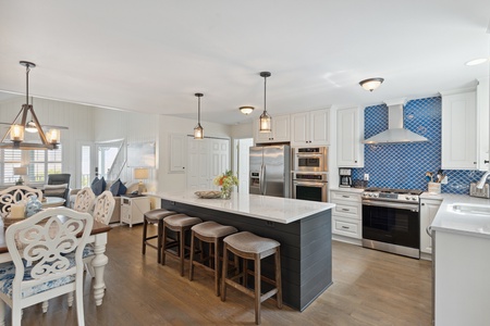 A large center island highlights the updated kitchen
