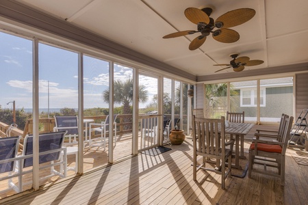 Relax under the fans on your screened-in porch