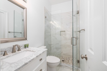 The first floor has a full hall bathroom just off the queen room