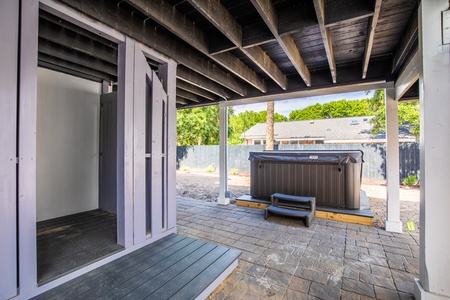 Your hot tub awaits just off the covered patio