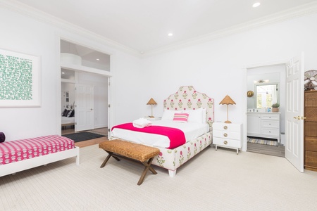 Downstairs, you'll find a queen bedroom with private en suite bathroom