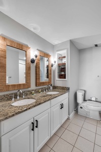 updated primary bathroom with a double vanity