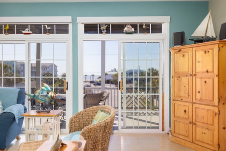 Step out onto your covered porch through the sliding glass doors
