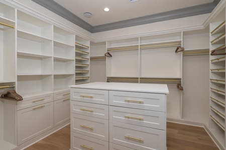 Your primary king bedroom includes a spacious walk-in closet with built-in organization