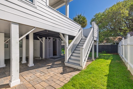 Take the stairs from the deck down to your backyard