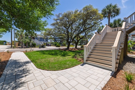 This beautiful walkway leads you from the driveway to your front steps