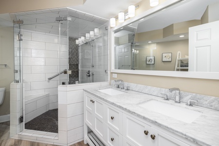 The primary en suite is a spa-like retreat