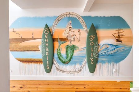 Say hi to the mermaid on your way to the living room!