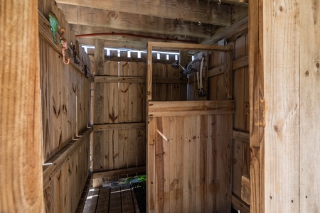 An outdoor shower is convenient after a day at the beach