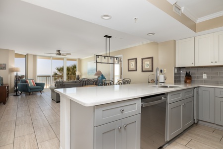 Your open kitchen flows into the living area with views of the ocean beyond
