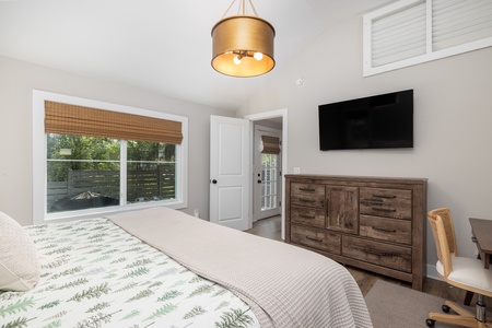 Your primary queen bedroom features an en suite bathroom and tons of natural light