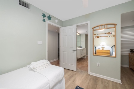 Rest peacefully in your cozy bedroom with soothing coastal colors and crisp linens, plus your own ensuite bathroom.