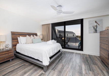 Your queen bedroom has a private balcony that overlooks the golf course