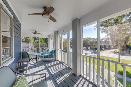 Take the door from your living room to your massive screened-in porch