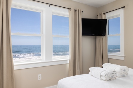 Wake up to breathtaking ocean waves right outside your window, where comfort meets the endless sea view.