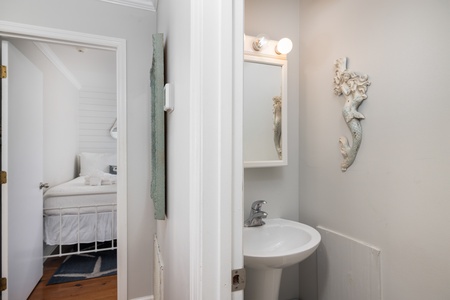 A hallway bathroom is easily accessible from your second bedroom