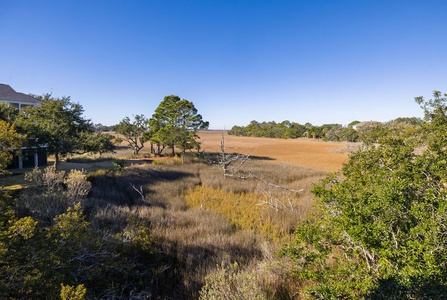 Expansive natural landscape with deer and plenty of water birds to keep you entertained in a serene setting.