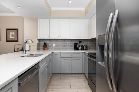 Your fully-equipped kitchen features stainless steel appliances and a double basin sink