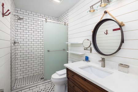 Your queen bedroom features an en suite bathroom with a walk-in shower