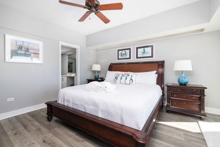 Your primary bedroom features a king size bed and en suite bathroom