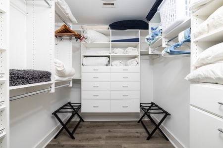 The primary bedroom offers a large walk-in closet