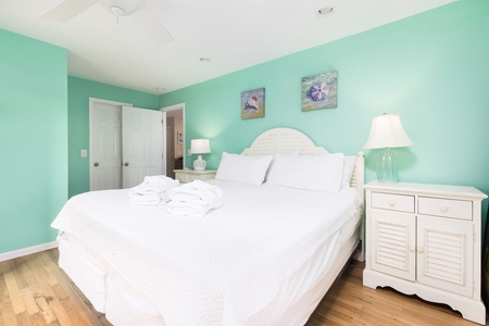 A king bed is perfect for sinking into after a day on the beach