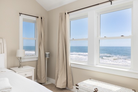 Wake up to breathtaking ocean views from your peaceful bedroom, where gentle waves and endless blue horizons greet you each morning.