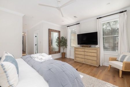 Plenty of natural light fills your primary bedroom