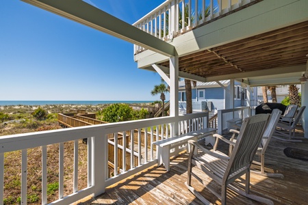 Your back porch faces the ocean and features ample seating
