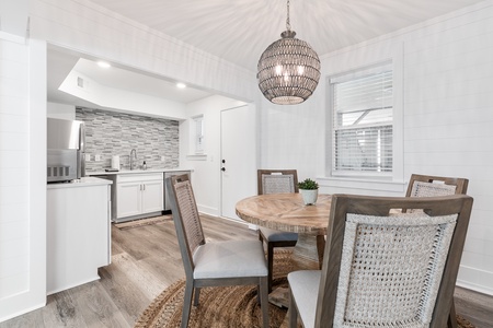 Downstairs, you'll find your own kitchen and dining area