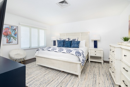 Unwind in your primary bedroom featuring a king size bed