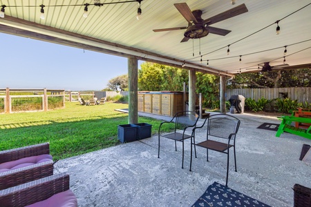 The covered back patio is a great place to hang out with friends and family