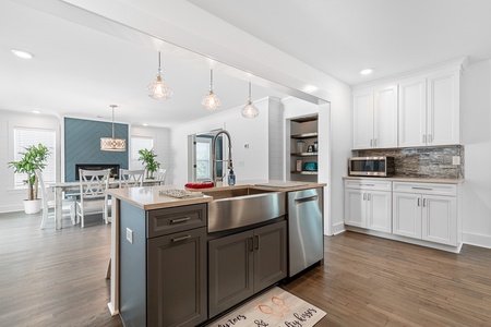 Your fully equipped kitchen flows seamlessly into the dining area