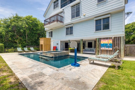 Spacious pool area with plenty of deck space for sunbathing and entertaining.