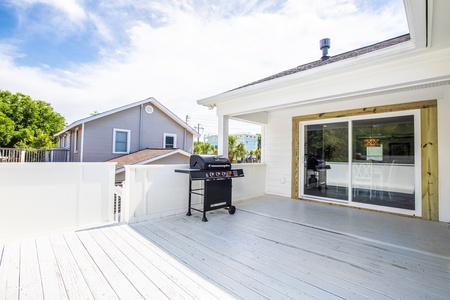 Fire up your grill on this spacious upstairs deck