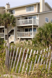 The Seagrove building is surrounded by natural landscaping.